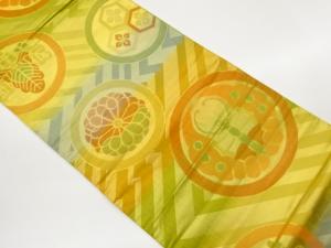 丸文に菊・花菱亀甲・蝶模様織出し袋帯